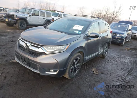 2017 Honda Cr-V Touring z USA, uszkodzony, nr VIN 2HKRW2H94HH617081